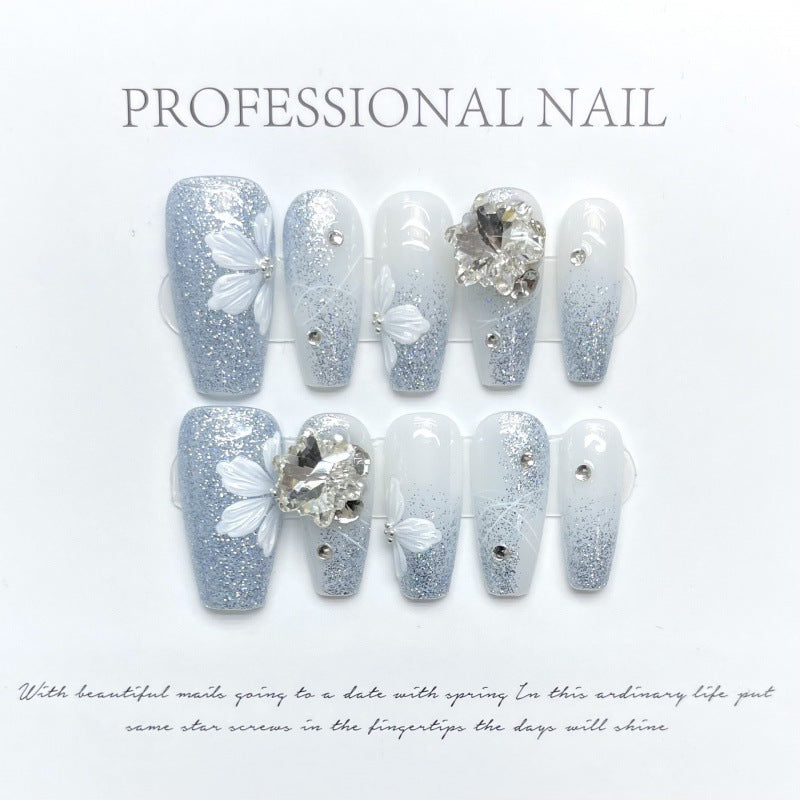 Crystal Bloom Elegance – Frosted Daisy Nails with Radiant Winter Glow