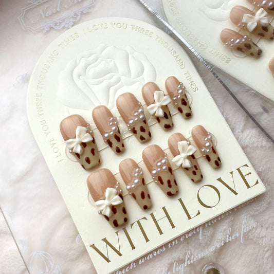 Wild Elegance – Animal Print with Pearl White Ribbon Accent